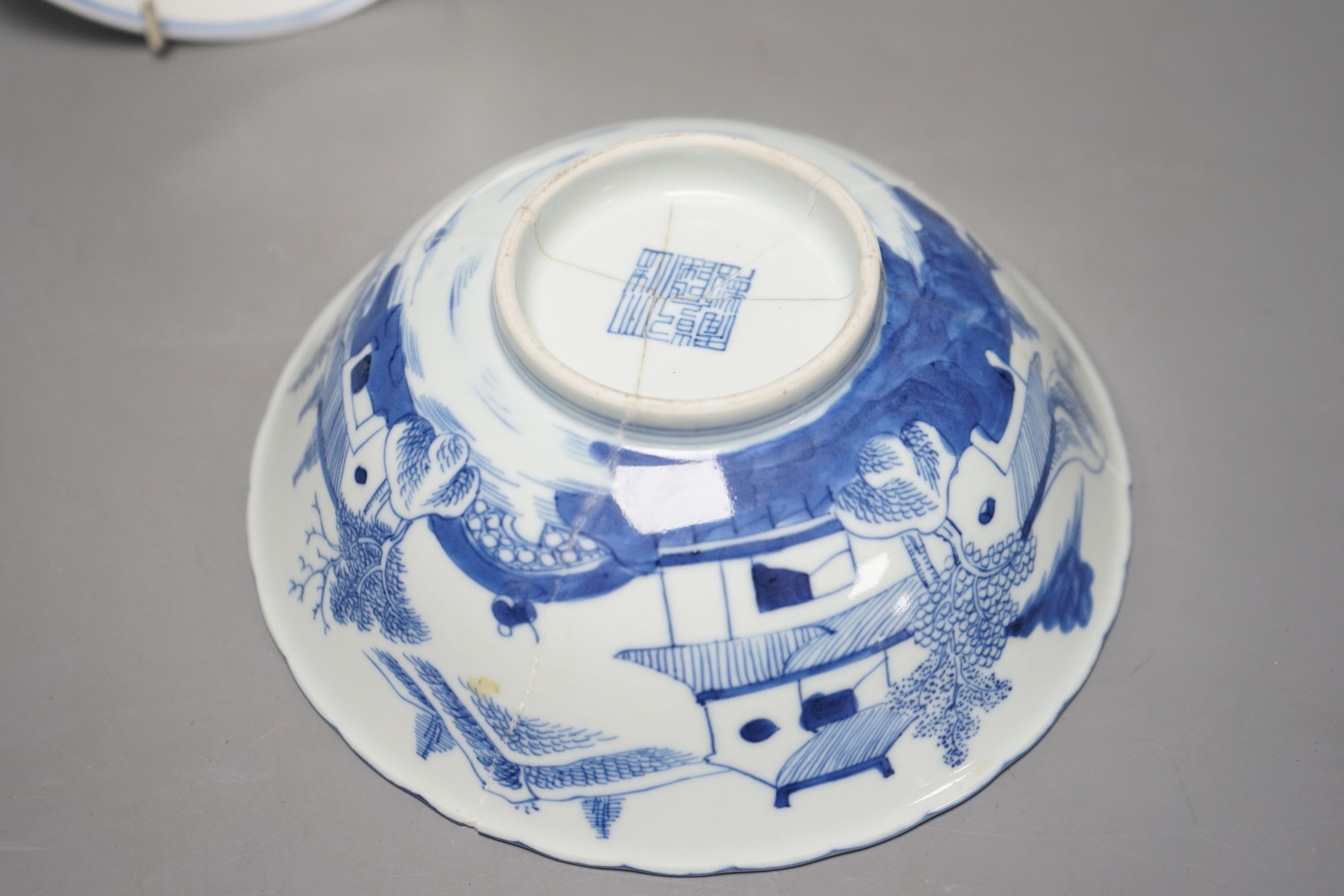 A Chinese blue and white landscape bowl, a/f and a Chinese blue and white 'dragon' dish, 18cm and 16.5cm